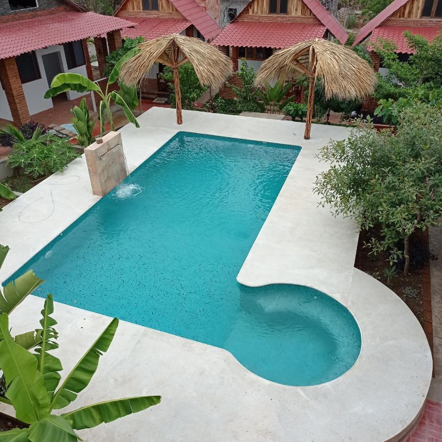 Bungalows Y Cabanas, Las Barracas De La Barra Malucano Bagian luar foto