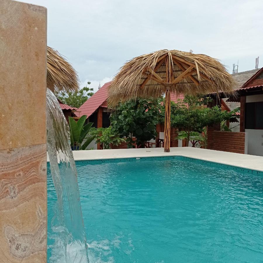 Bungalows Y Cabanas, Las Barracas De La Barra Malucano Bagian luar foto